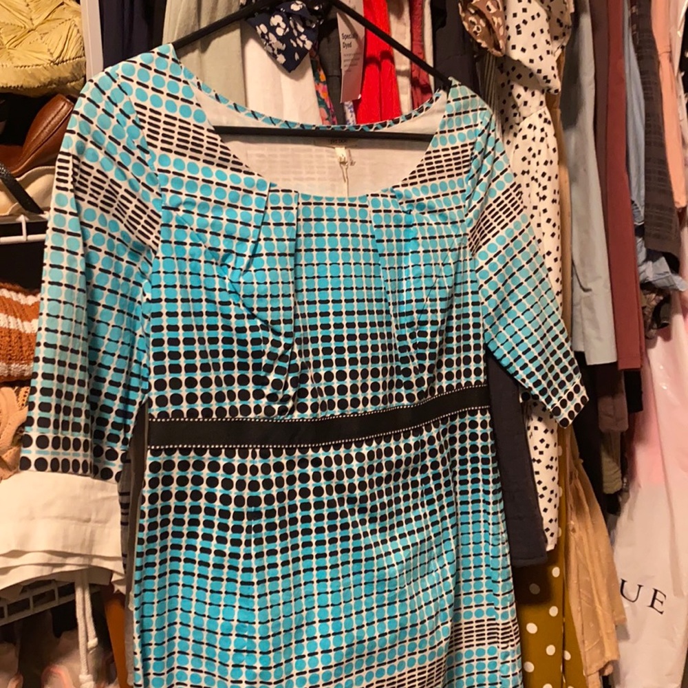 Tyler Boe dress aqua with white and black.